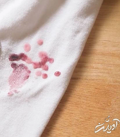 از بین بردن لکه شمع روی لباس